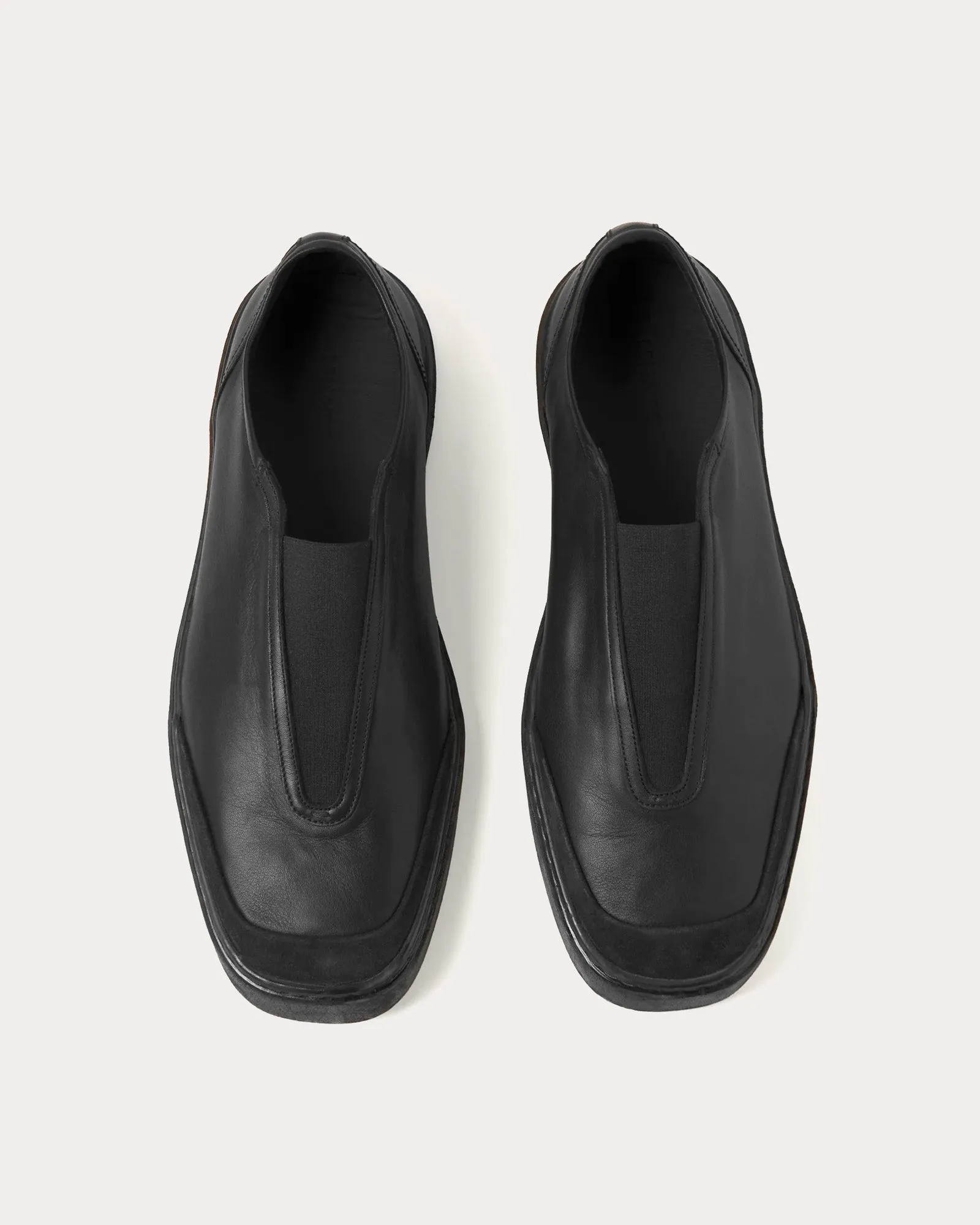 Linoleum Elastic Soft Leather Black Low Top Sneakers